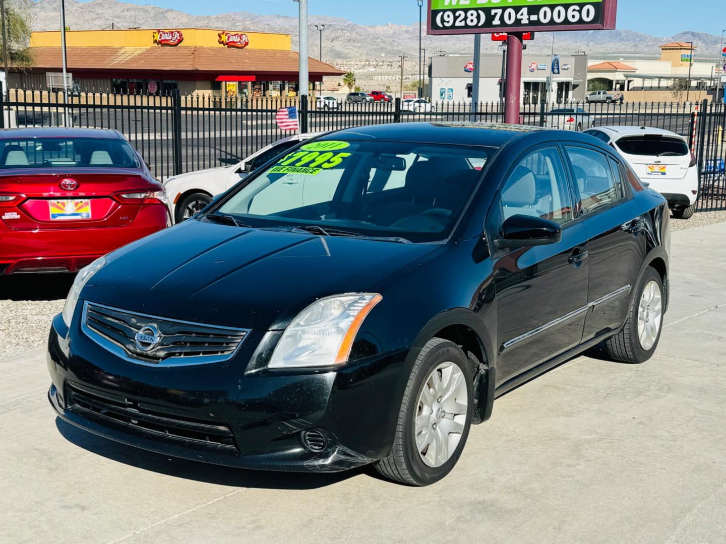 2011 Black Nissan Sentra , located at 2190 Hwy 95, Bullhead City, AZ, 86442, (928) 704-0060, 0.000000, 0.000000 - 2011 Nissan Sentra. automatic 4 cylinder. great gas mileage. Brand new tires. cold air conditoning. free warranty. In house financing available. - Photo#0